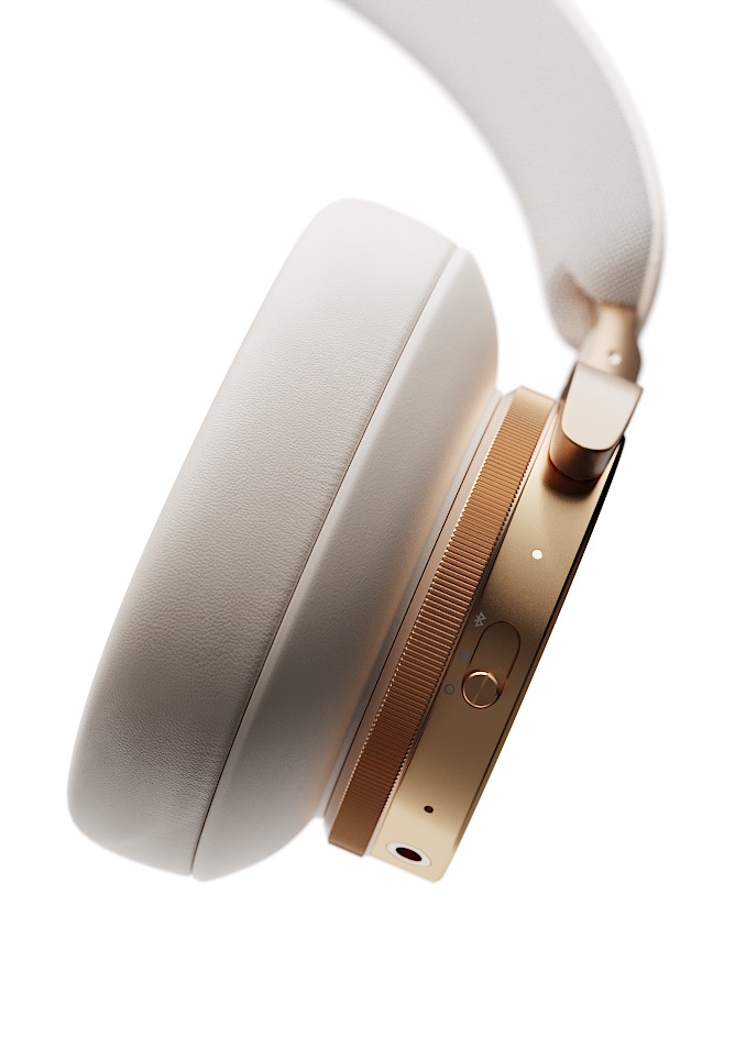 Close-up CGI render of the Beoplay H95 knurled control dial, switch, aluminum frame, and leather ear cushion