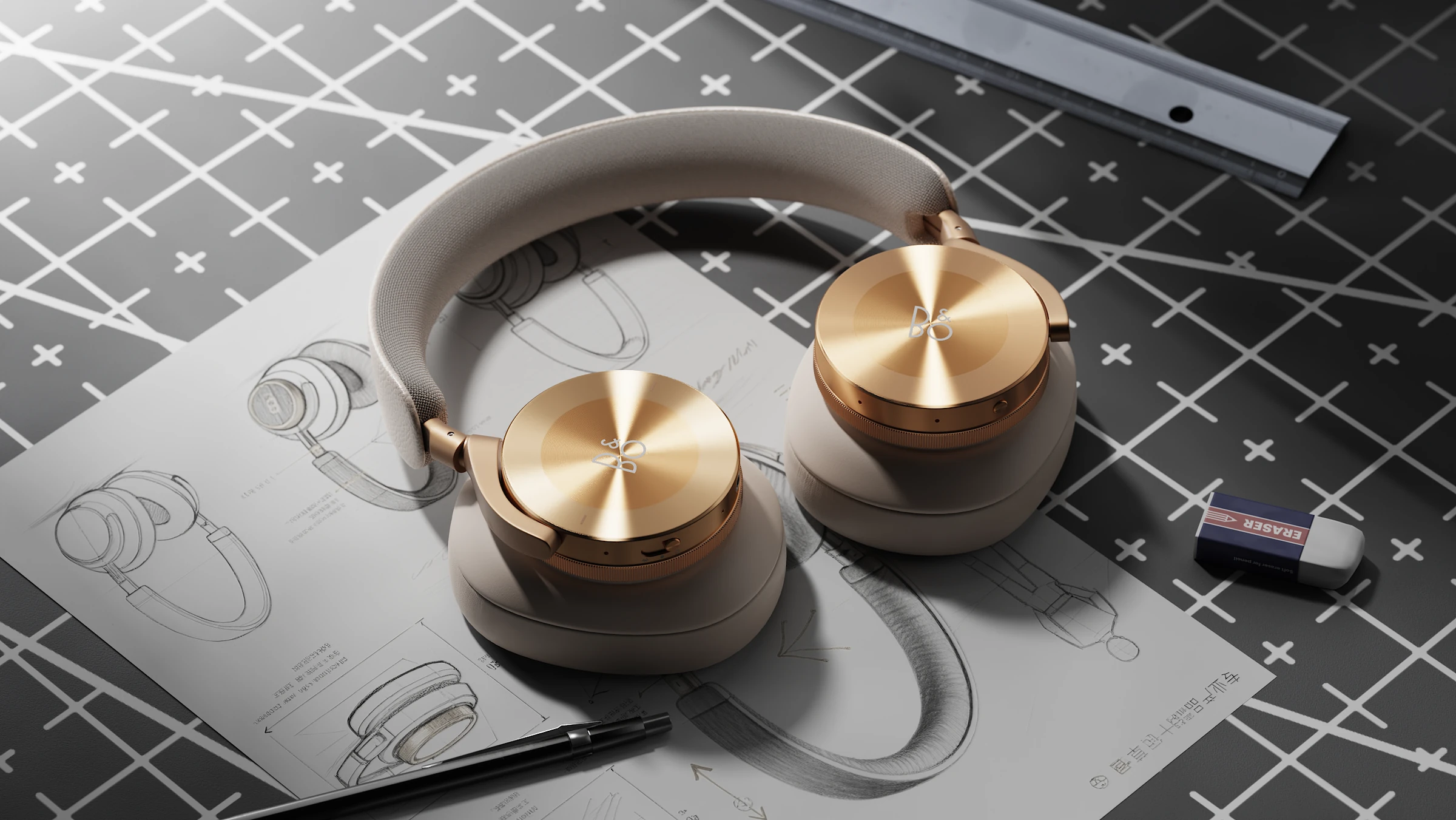 Golden Tone over-ear headphones presented on an industrial design sketch sheet in a studio scene