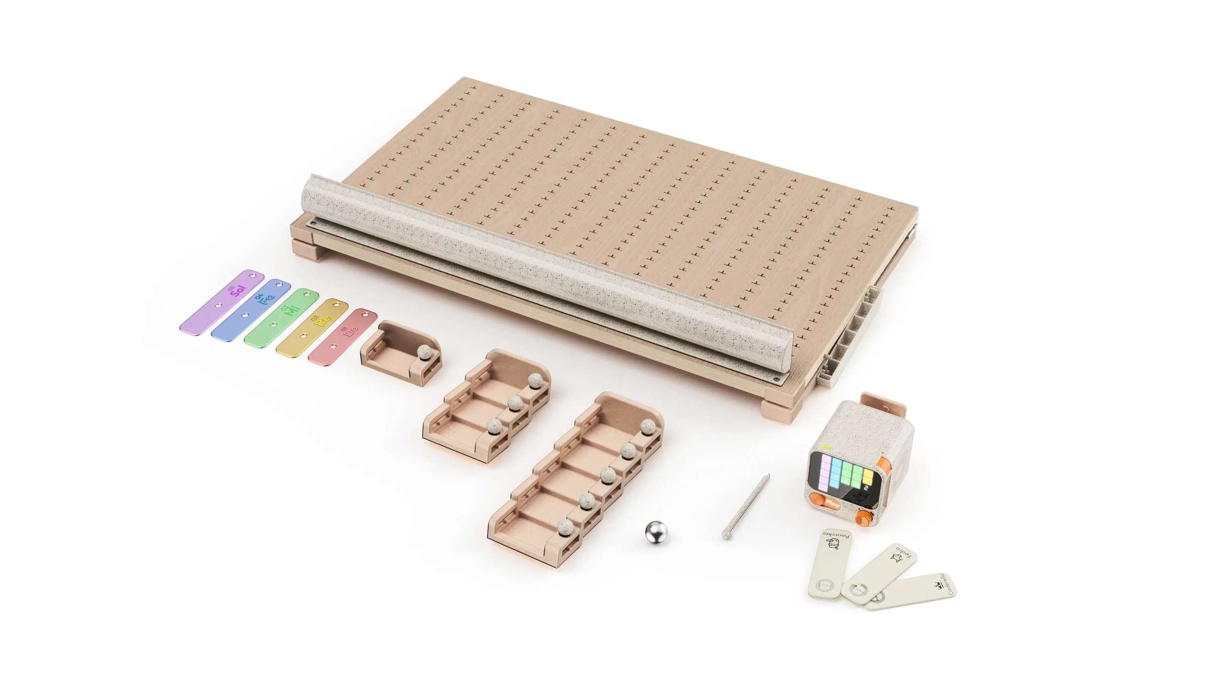 Melody Adventurer shown disassembled into its panel, tracks, keys, narrative module, and accessories